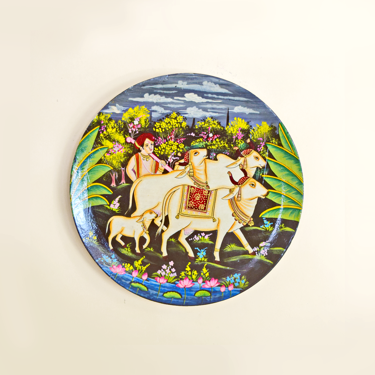 Decorative plate with Hand painted farmer with group of cows with garden in background