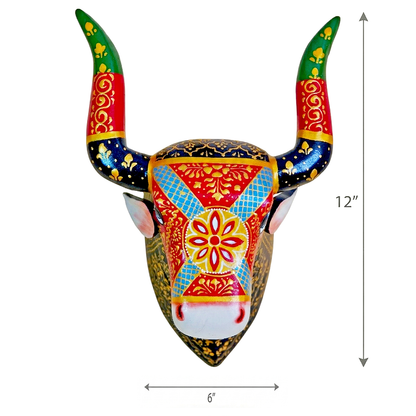 Decorative bull head wall art hand painted on wood with colorful patterns and measurements on a white background