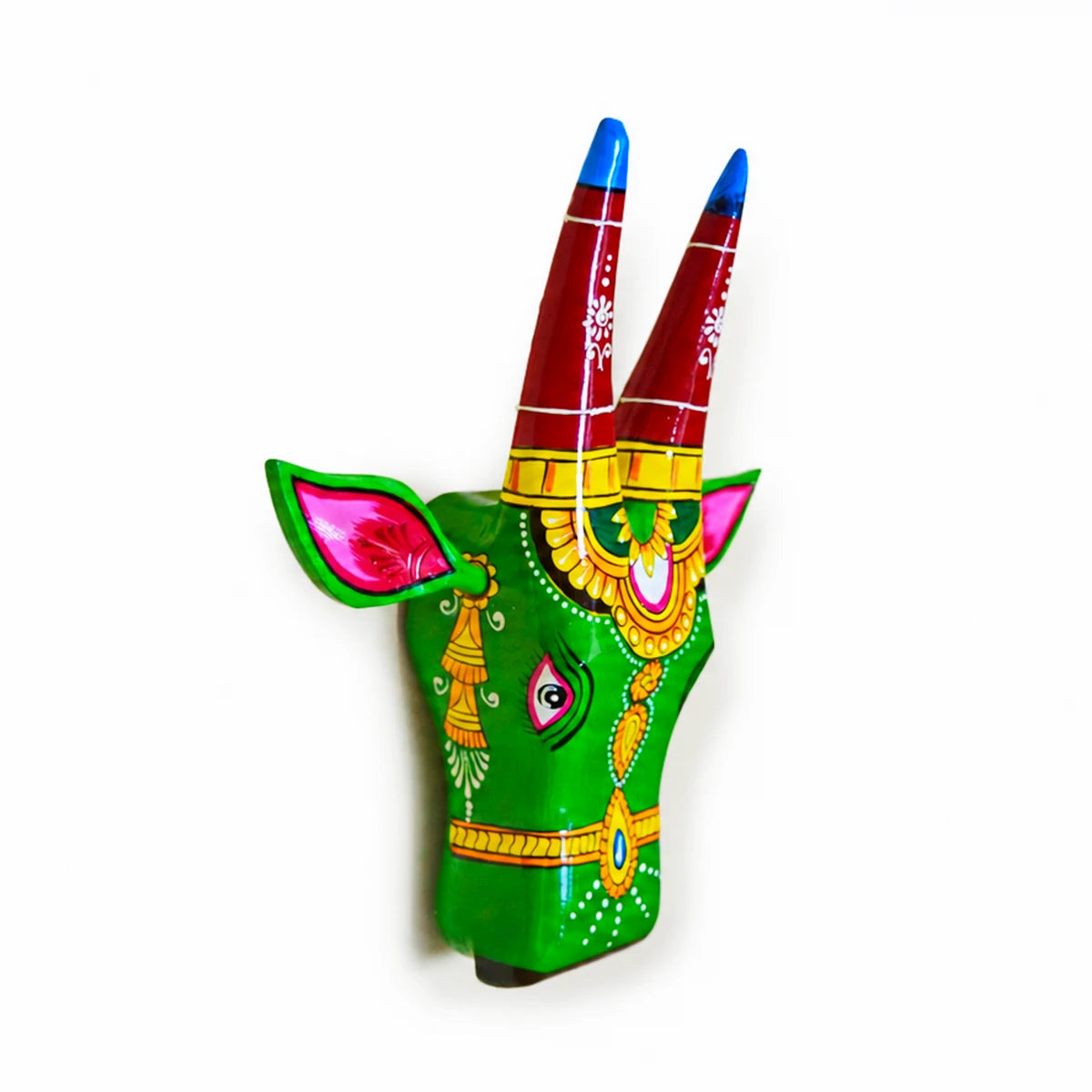 Buy handcrafted 12-inch wooden cow head wall decor featuring vibrant hand-painted artwork. Vastu-inspired design believed to attract positive energy, prosperity, and elegance to your home.