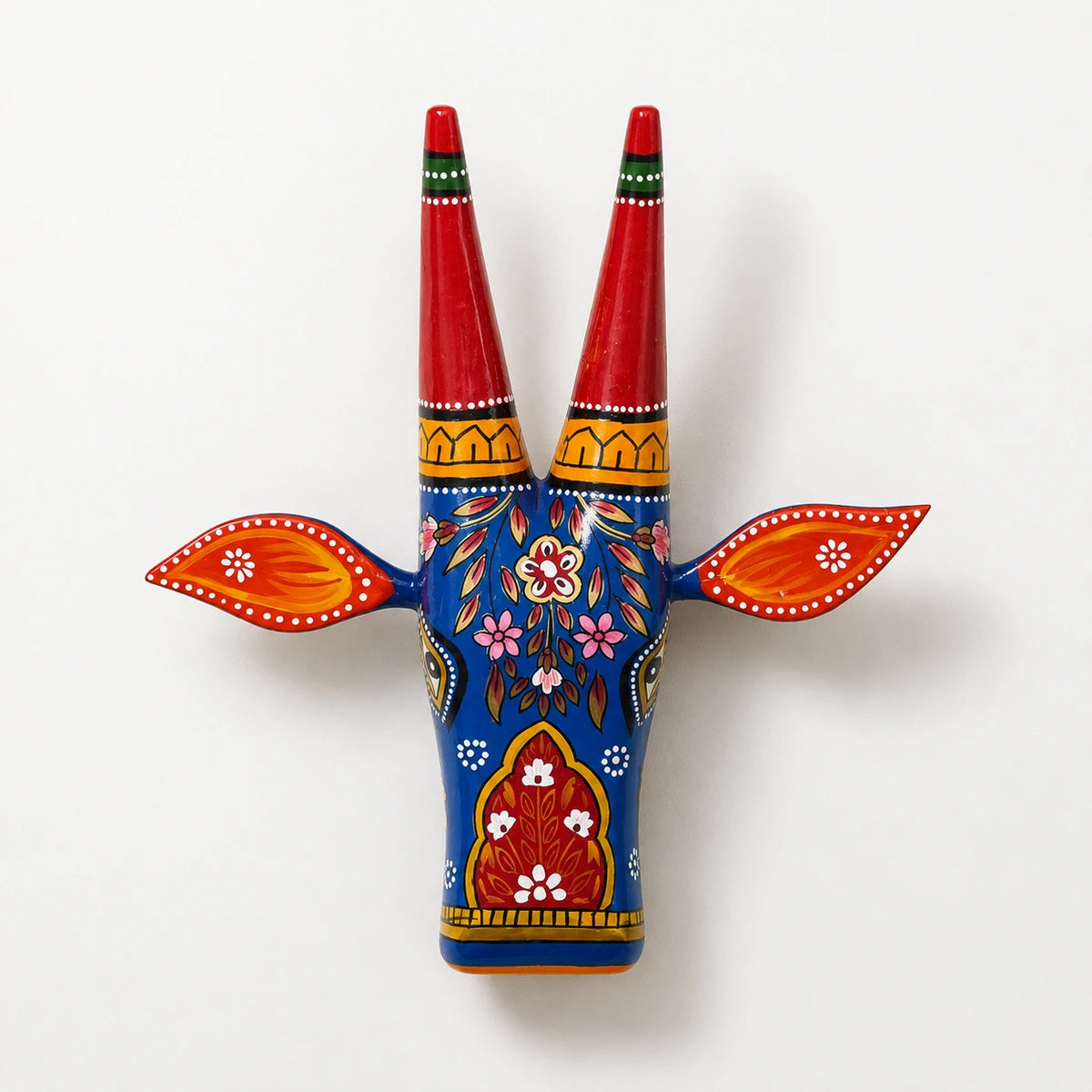 12-inch wooden cow head wall decor featuring vibrant hand-painted artwork. Vastu-inspired design believed to attract positive energy, prosperity, and elegance to your home.
